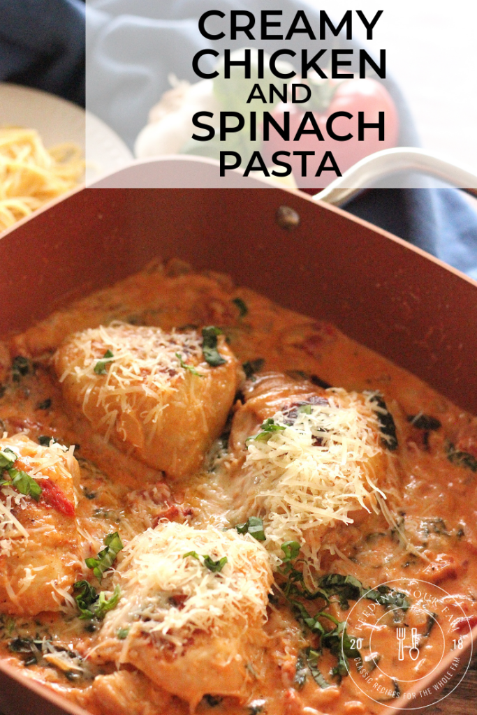 Pan of chicken thighs with creamy spinach tomato sauce. 