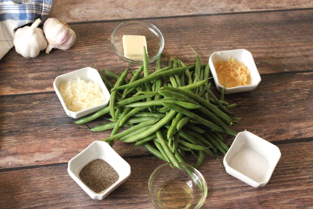 Ingredients for garlic parmesan green beans. Green beans, parmesan, butter, olive oil, garlic and salt and pepper