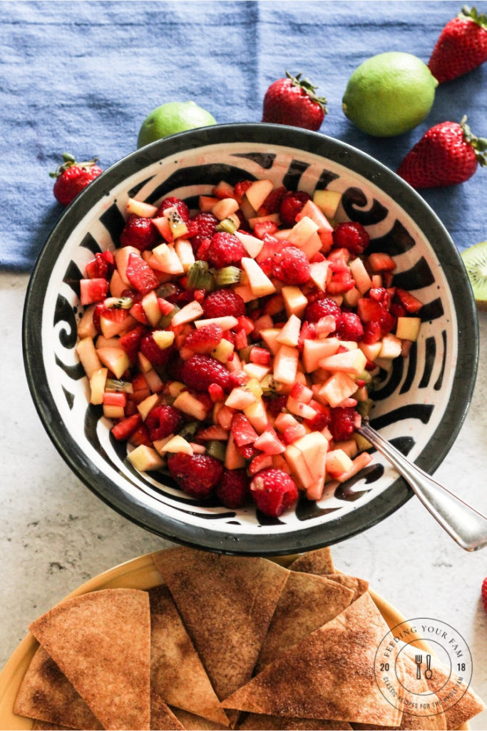 Fruit salsa in a bowl with cinnamon chips