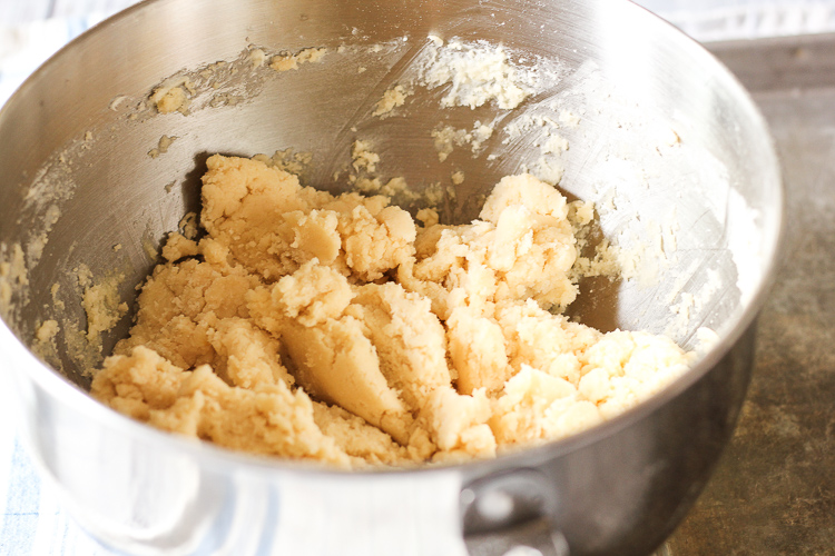 lemon sugar cookie dough in mixing bowl