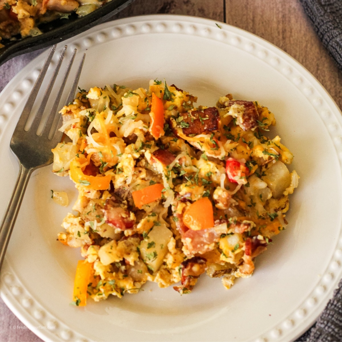 breakfast hash with eggs, bacon and potatoes