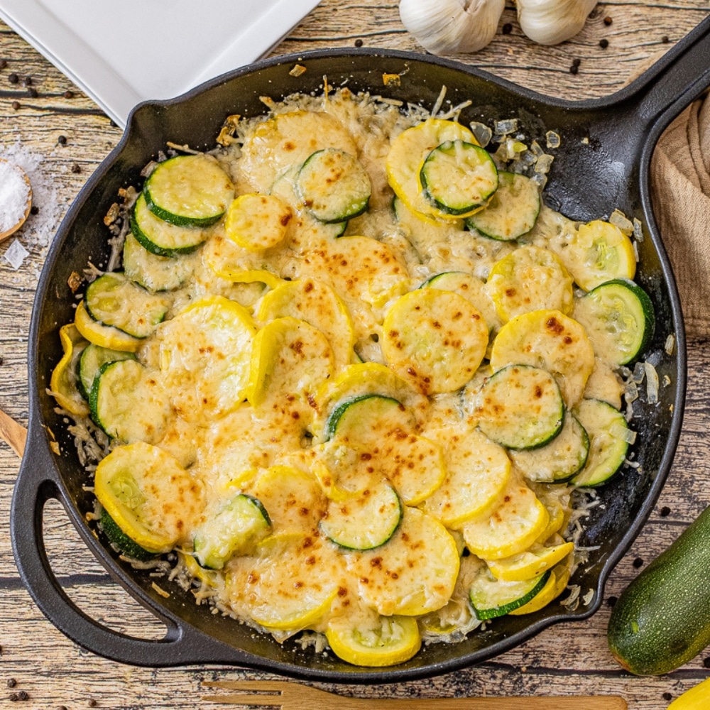 cooked zucchini topped with parmesan