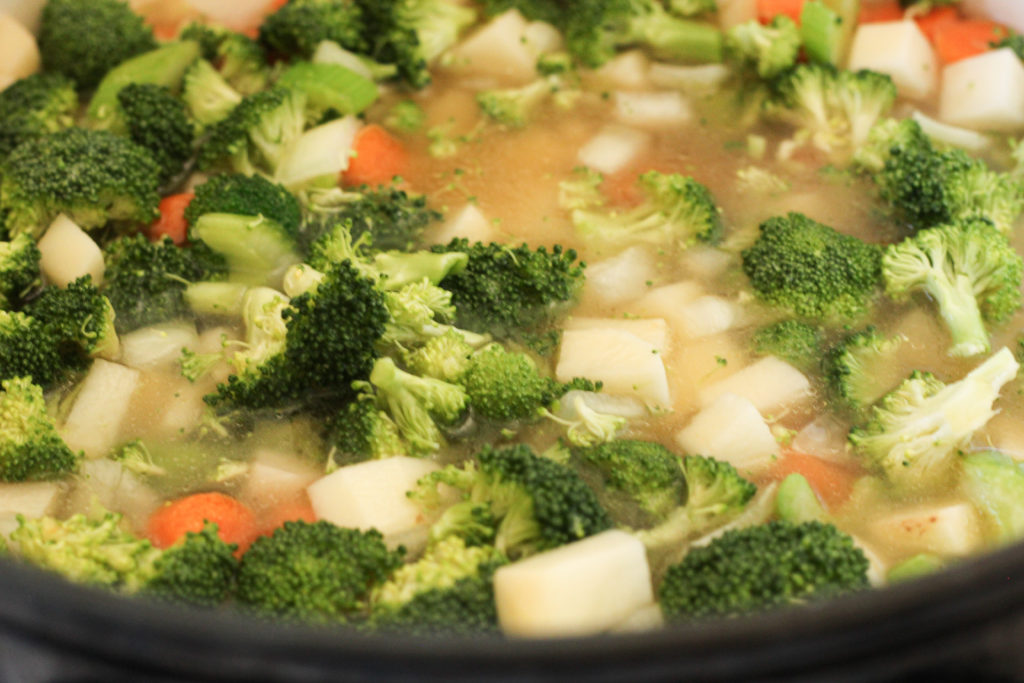 broccoli and potatoes in chicken broth
