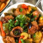 pepper and sausages in sweet and sour sauce