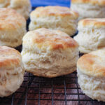 fluffy biscuits on a cooling rack