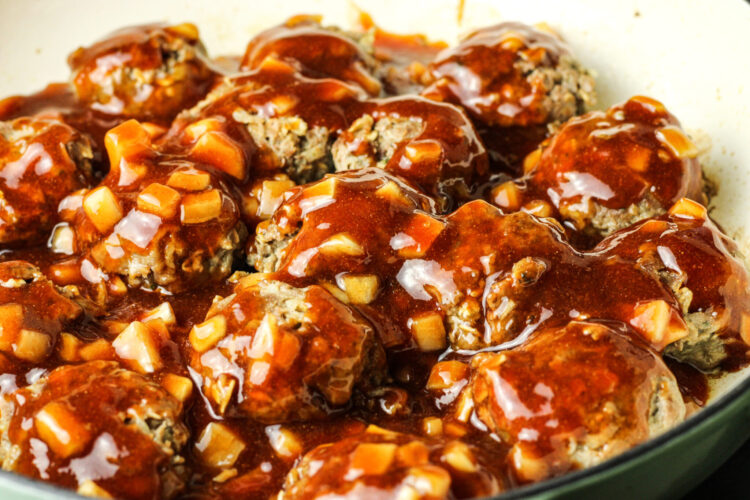 meatballs covered in sweet and sour sauce