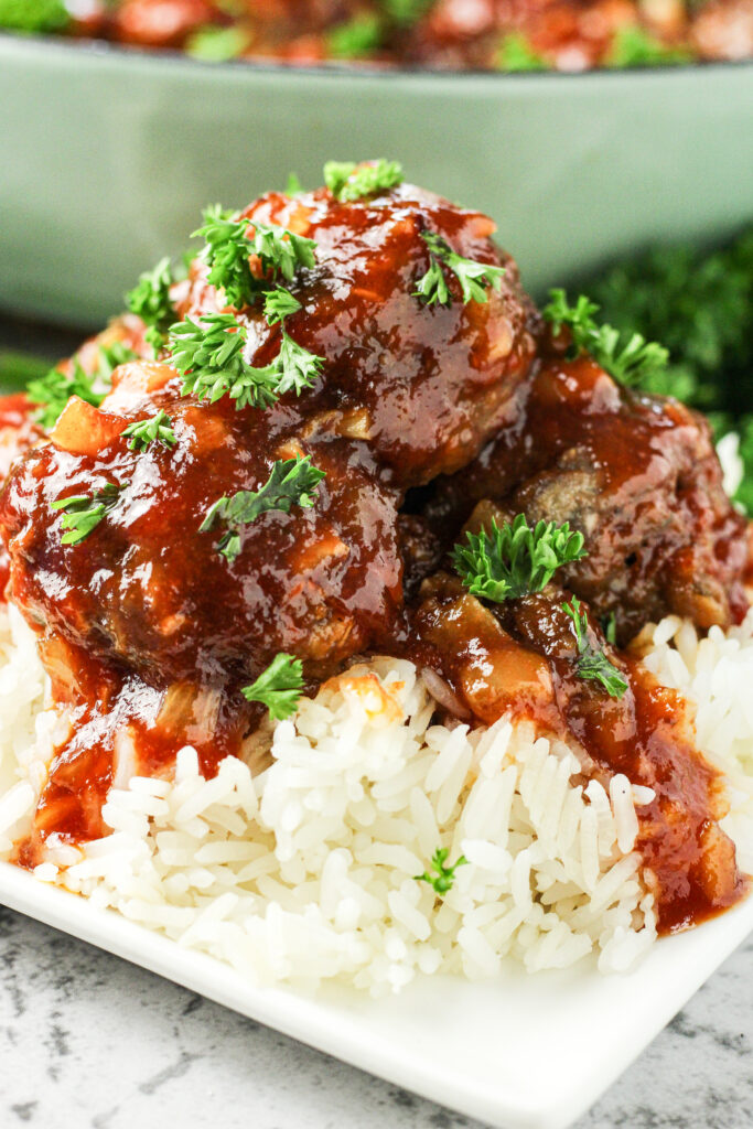 sweet and sour meatballs over rice