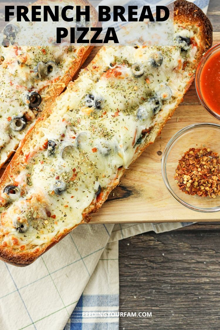 french bread pizza loaves on a wooden platter