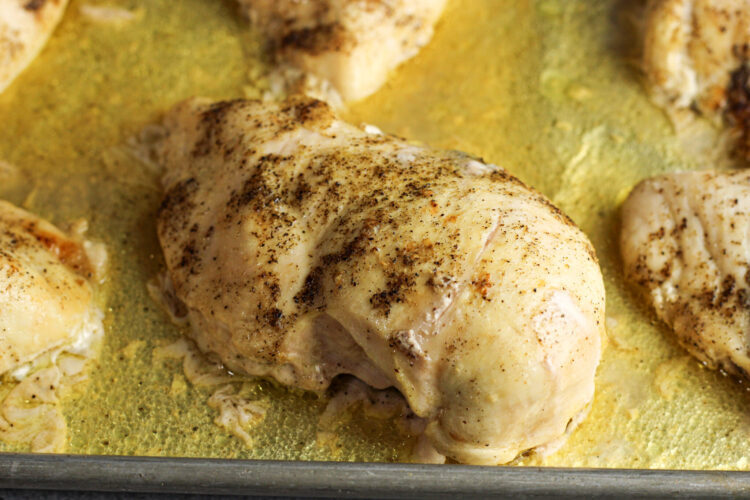 cooked chicken breast seasoned with salt and pepper