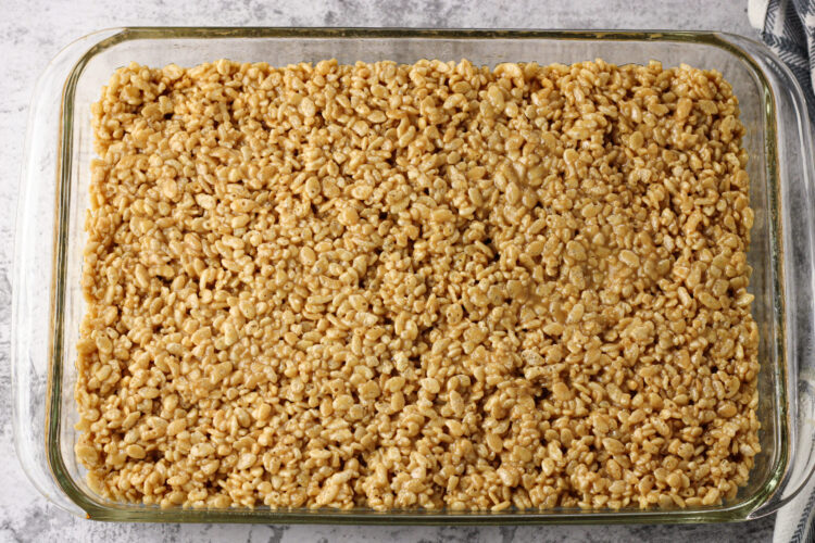 peanut butter rice krispies pressed into a pan