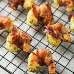 bacon wrapped shrimp on cooling rack