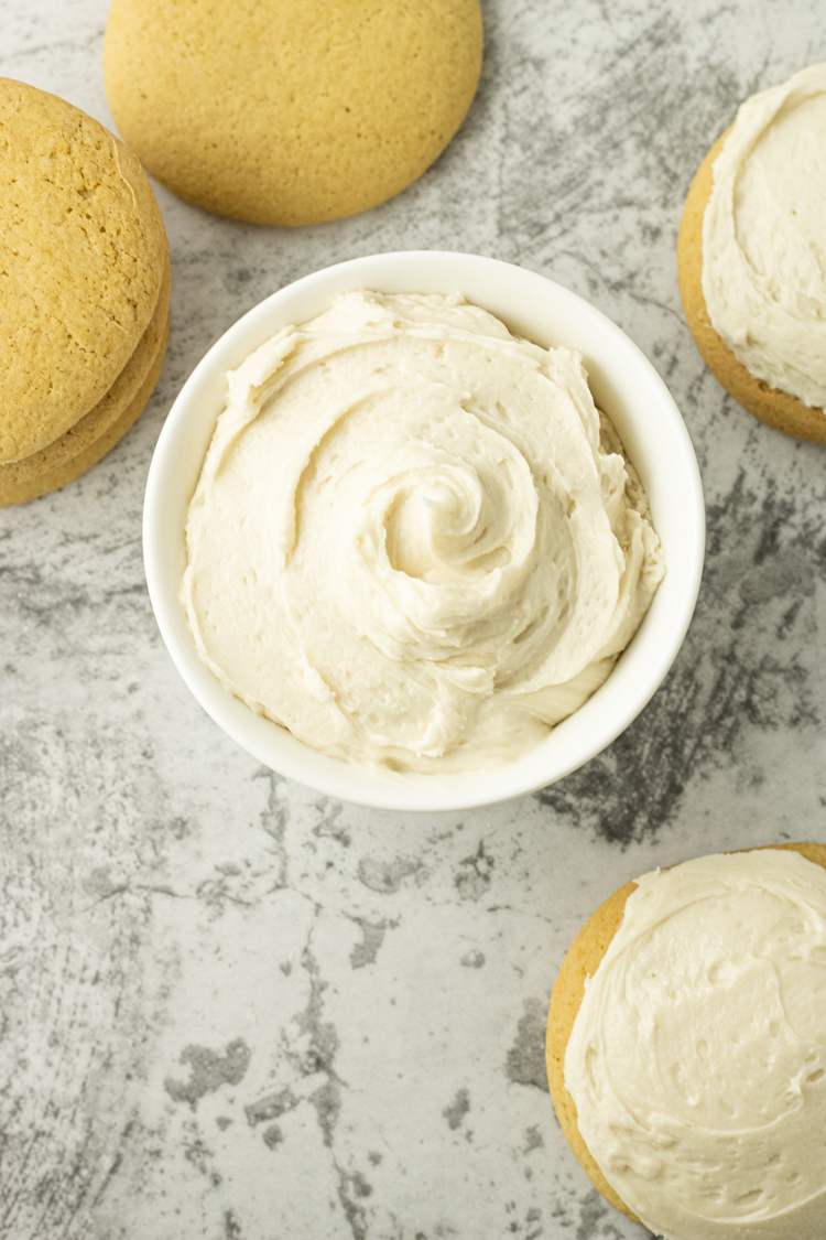 small bowl of white buttercream frosting