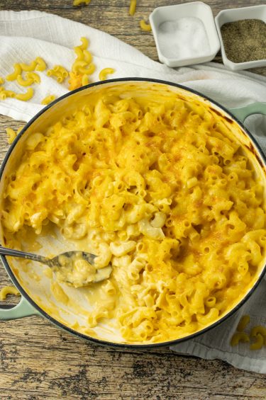 cheesy pasta with a scoop out