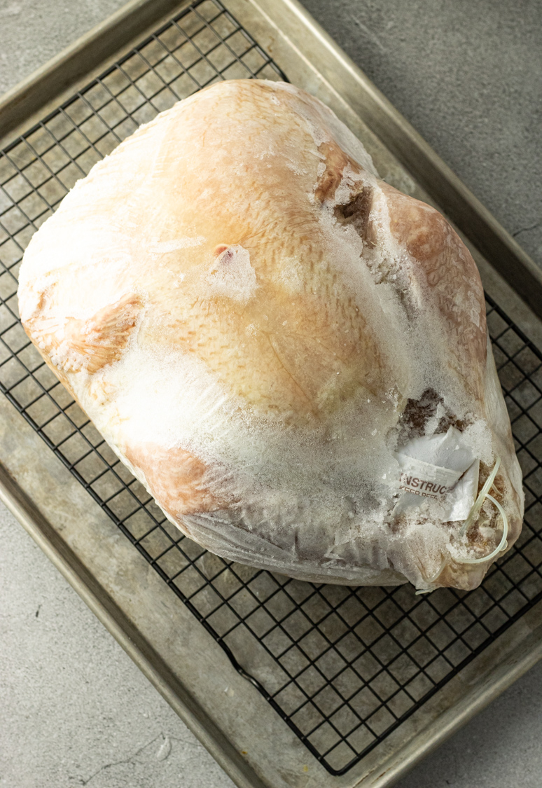 frozen turkey on a baking sheet