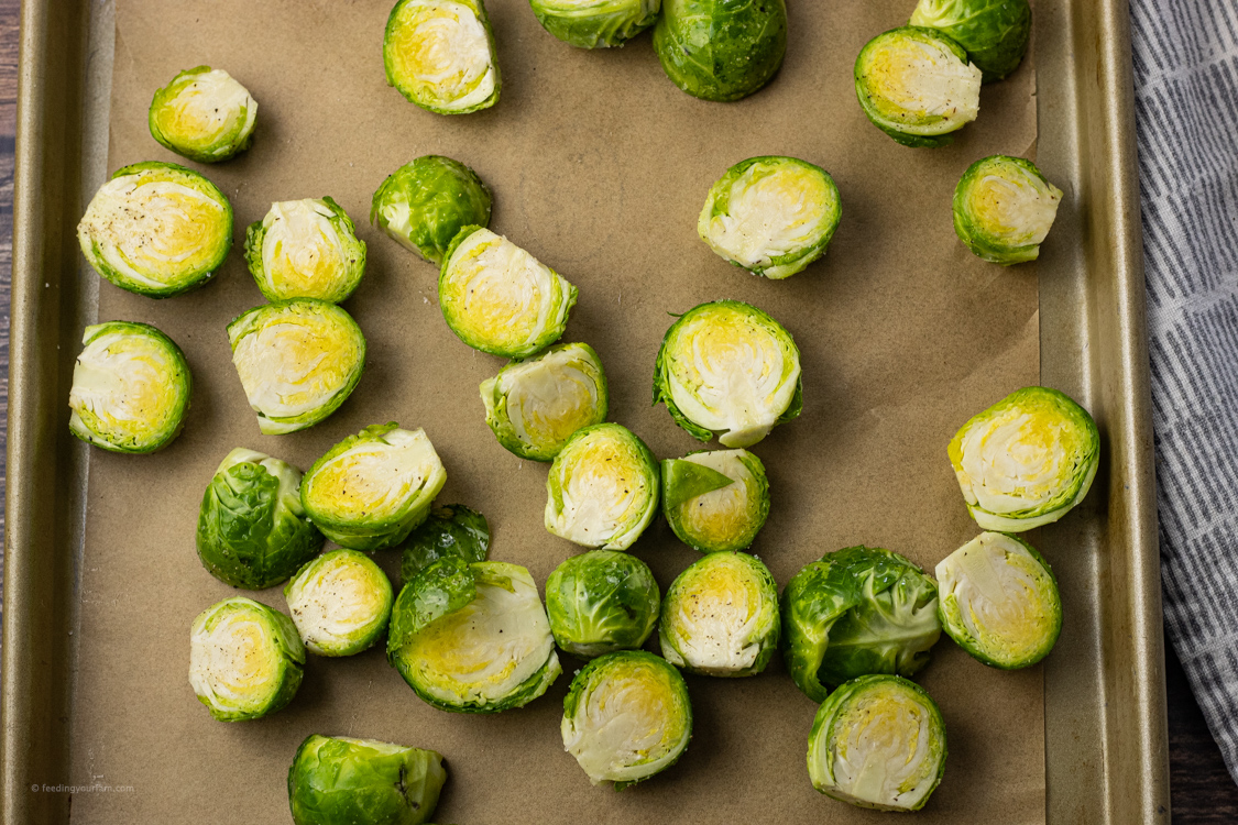 sliced brussel sprouts on a baking sheet