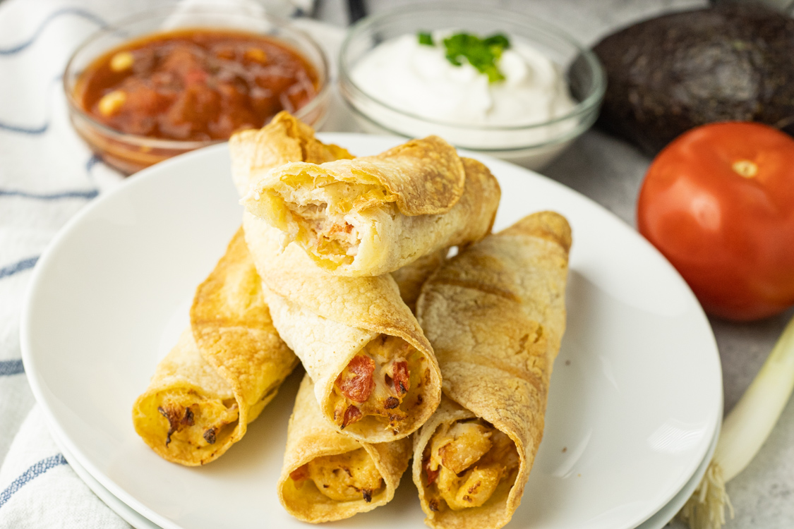 plate of rolled taquitos