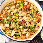 big pan of chicken and vegetable stir fry