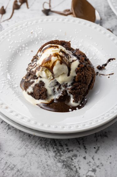 lava cake topped with vanilla ice cream