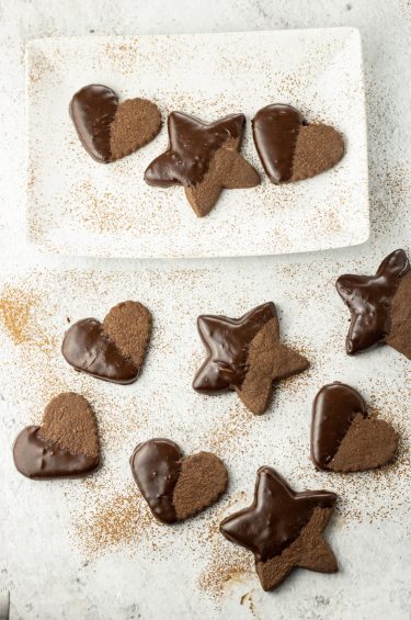 dipped chocolate cookies in heart and star shapes