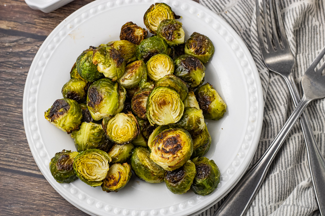 roasted brussel sprouts on a white plate