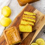 slices of yellow lemon bread on a wooden platter