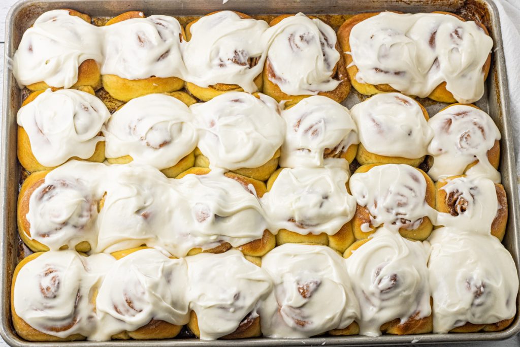 big pan of frosted cinnamon rolls