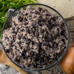 glass bowl with black beans and long grain rice