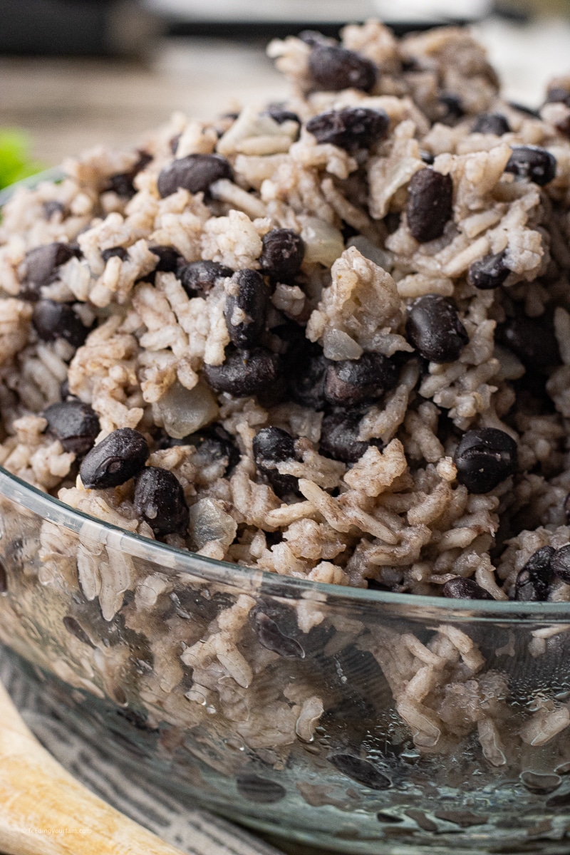 black beans and rice cumin in a glass bowl