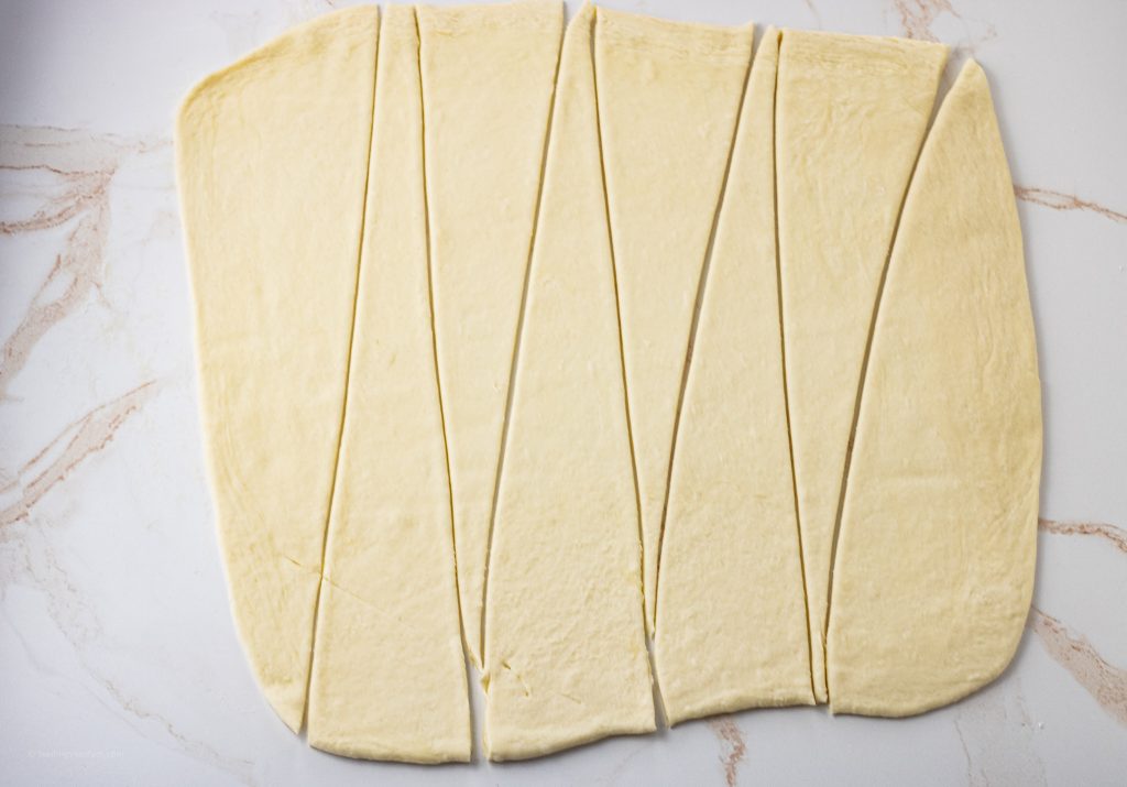 dough sliced into triangles