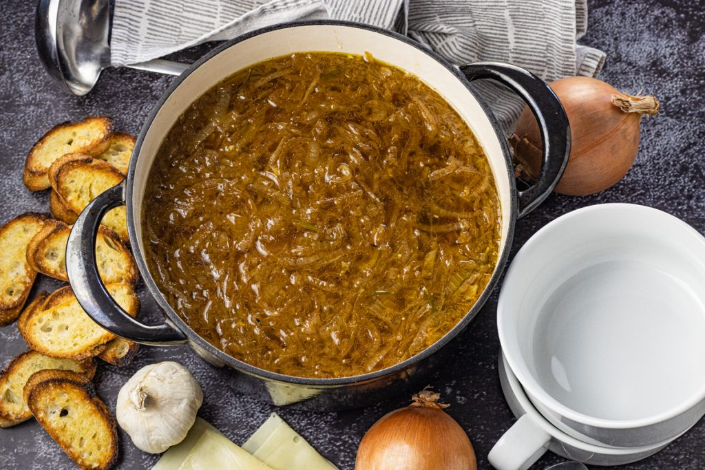 onion soup in a big black pot