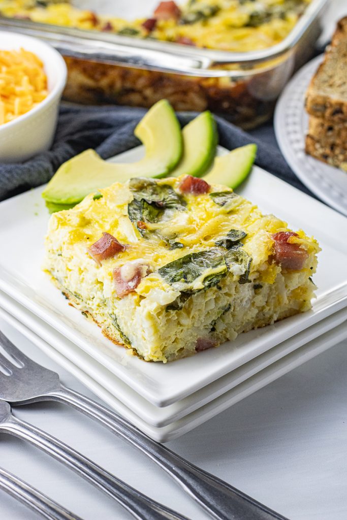 square piece of egg, hashbrown, spinach breakfast casserole