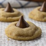 chocolate kisses on top of peanut butter cookies