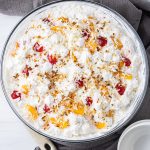 fruit salad with cherries, oranges and pineapples, small pasta and whipped topping