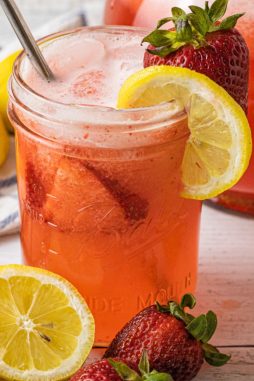 jar of lemonade with strawberries
