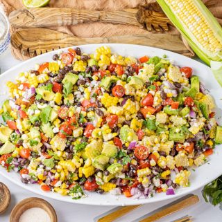 corn salad on a white platter
