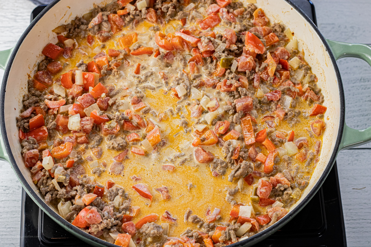 cooked peppers, onions, ground beef and creamy sauce
