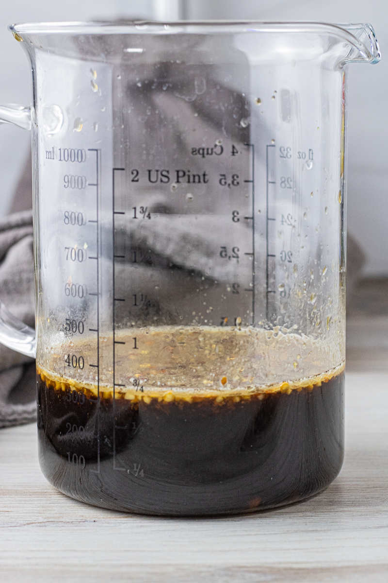 glass mixing jar filled with teriyaki sauce