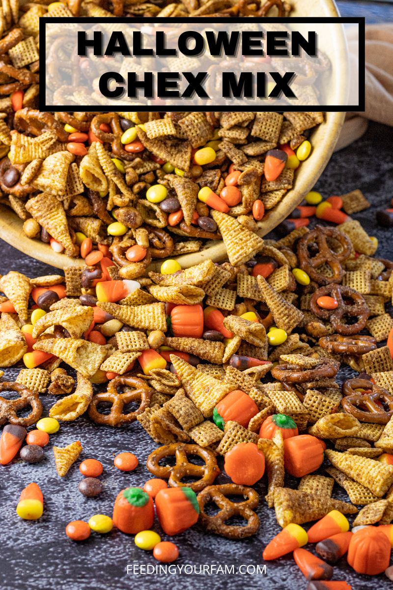 Chex mix with pretzels, peanuts, candy corn and Reeses candy