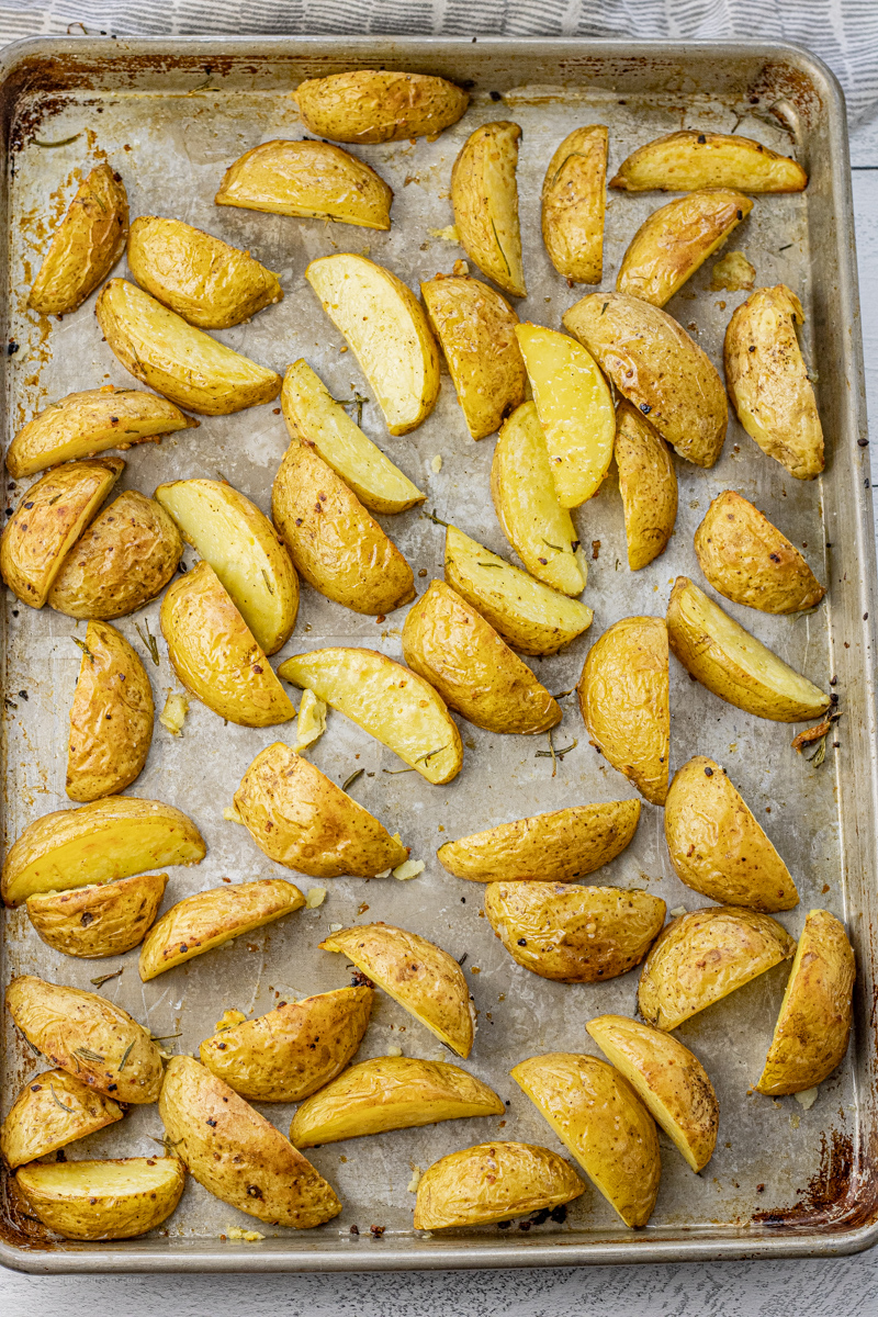 roasted golden potatoes on a baking sheet