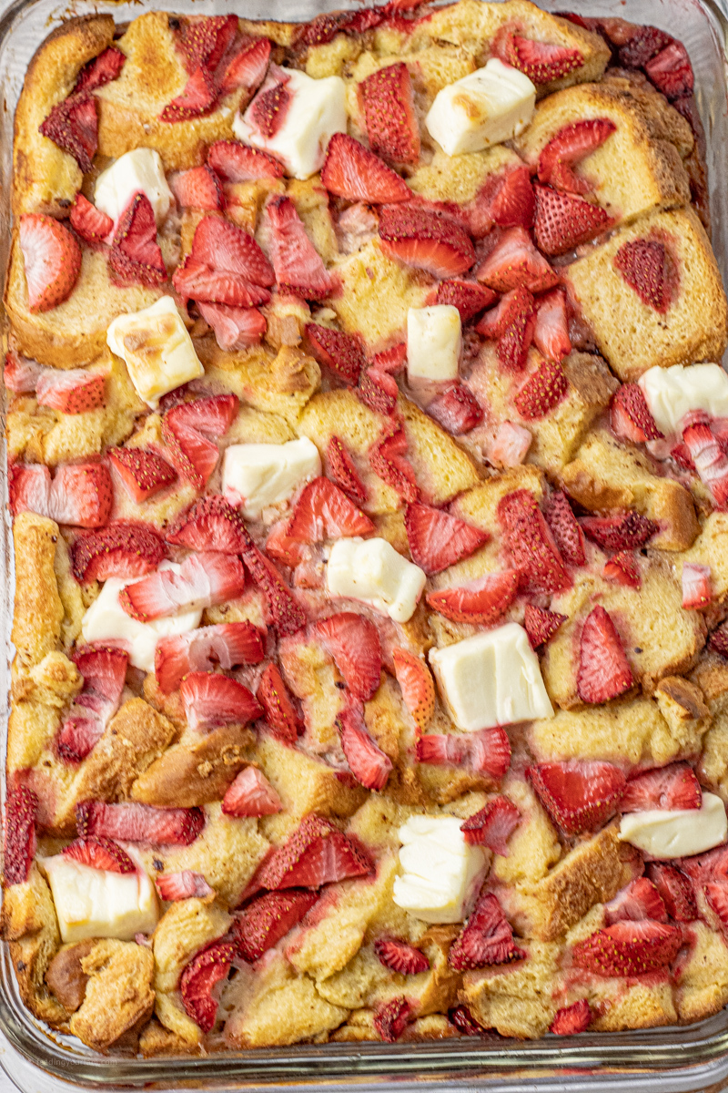 close up of baked strawberries and cream cheese french toast casserole