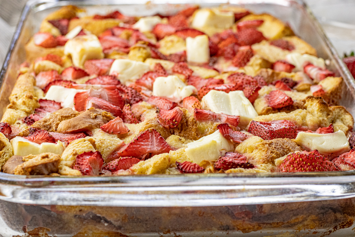 close up view of strawberries and cream cheese french toast casserole