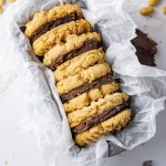 peanut butter and chocolate sandwich cookies in a pan