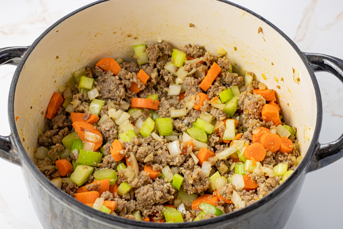 sausage, carrots, onions and celery in a big pot