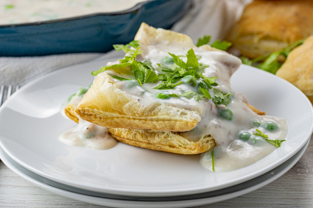 puff pastry topped with tuna gravy and parsley