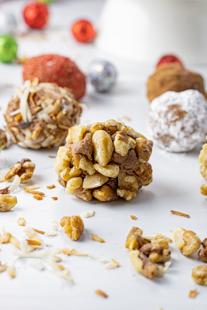 chocolate truffle balls coated in nuts, powdered sugar or coconut