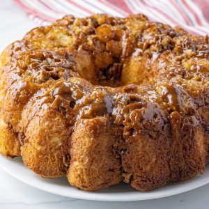 ring of bread topped with caramel and pecans