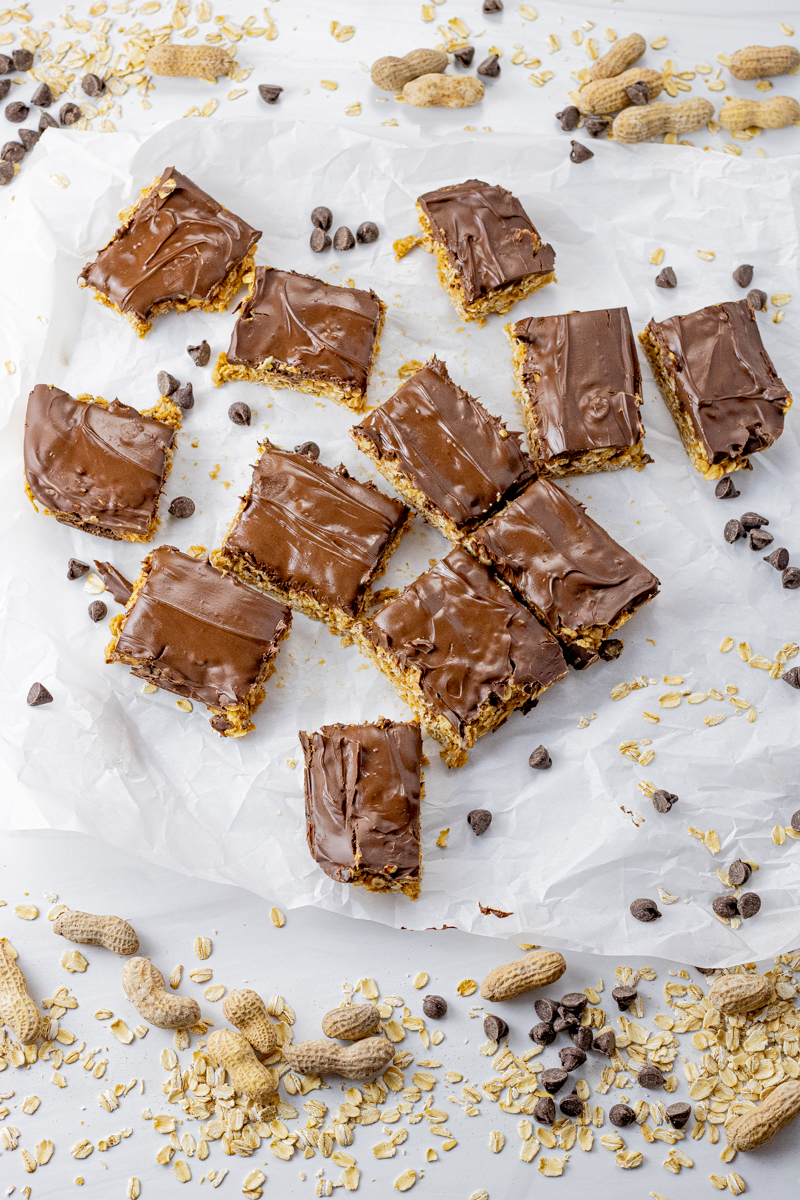 sliced peanut butter oatmeal bars on parchment paper