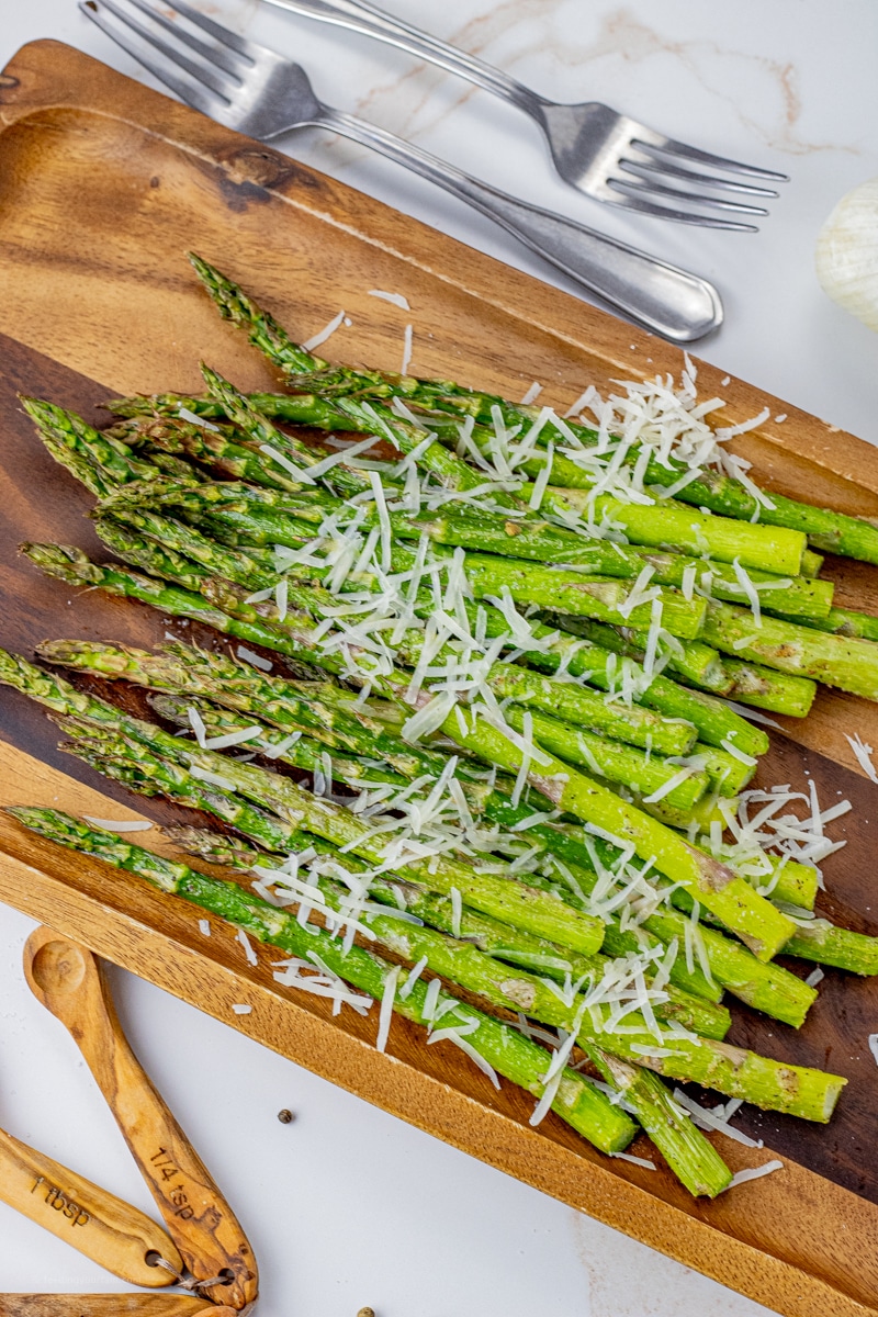 Air Fryer Asparagus is a super simple and delicious vegetable side dish. This asparagus in the air fryer recipe is made with just a few easy ingredients and makes the perfect side dish for any meal. Cooking asparagus in the air fryer makes this recipe quick, healthy and easy.