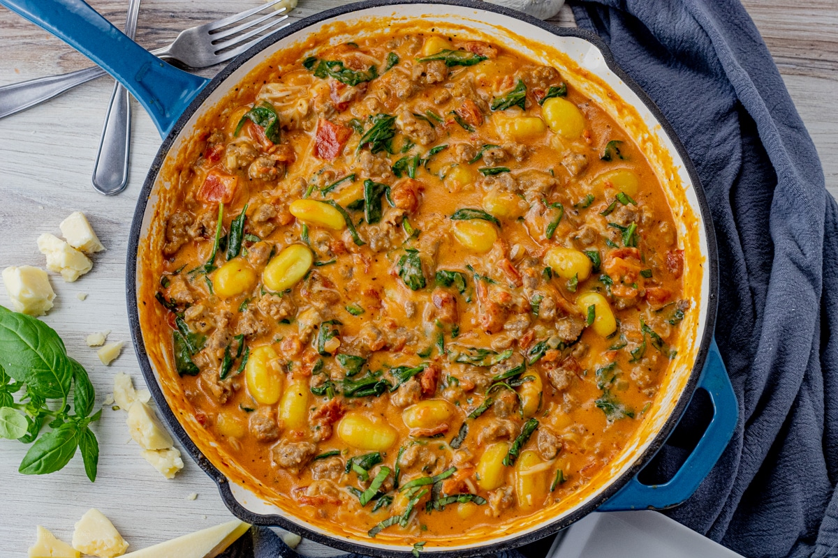 gnocchi with a creamy tomato sauce with sausage and spinach