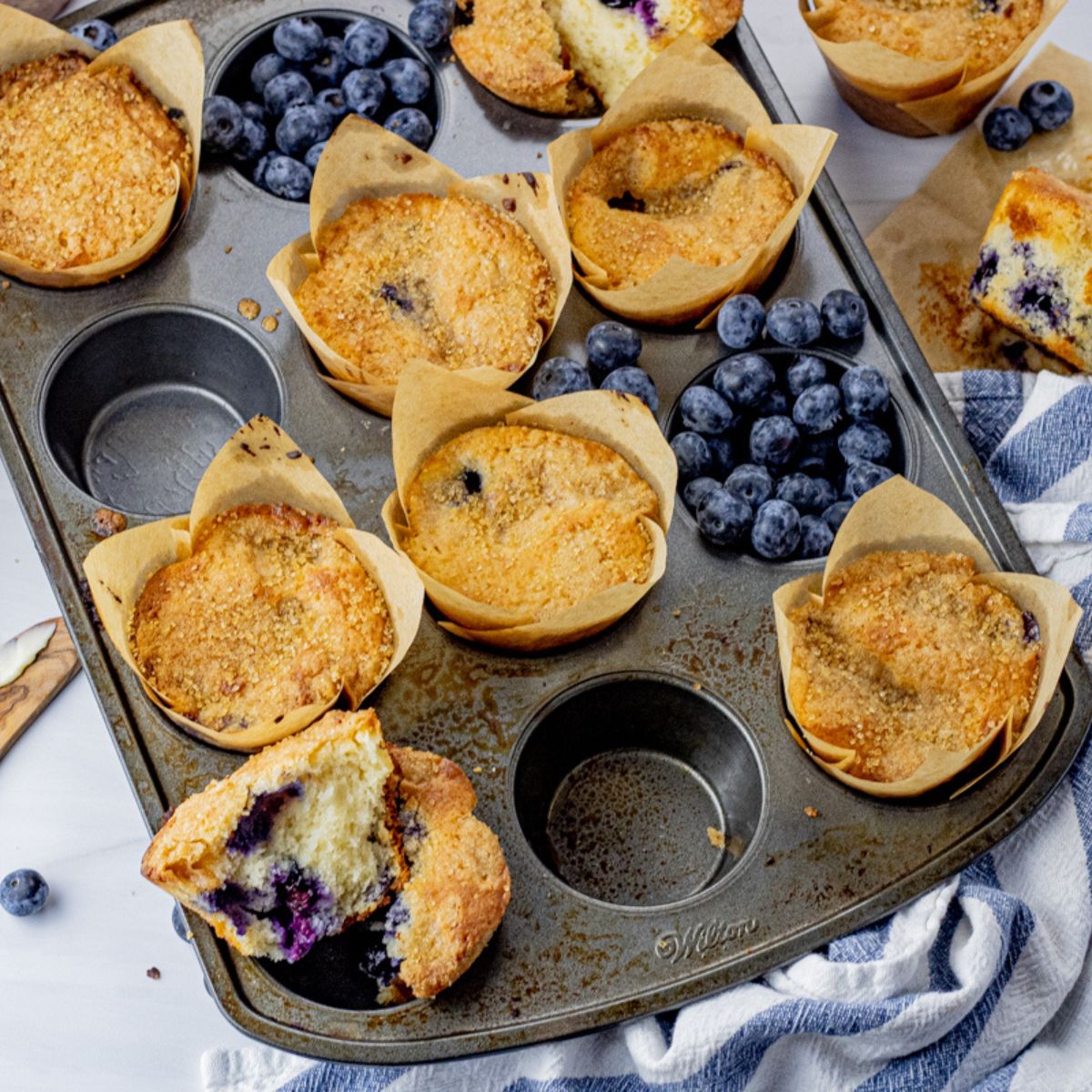 blueberry muffins in a muffin tin